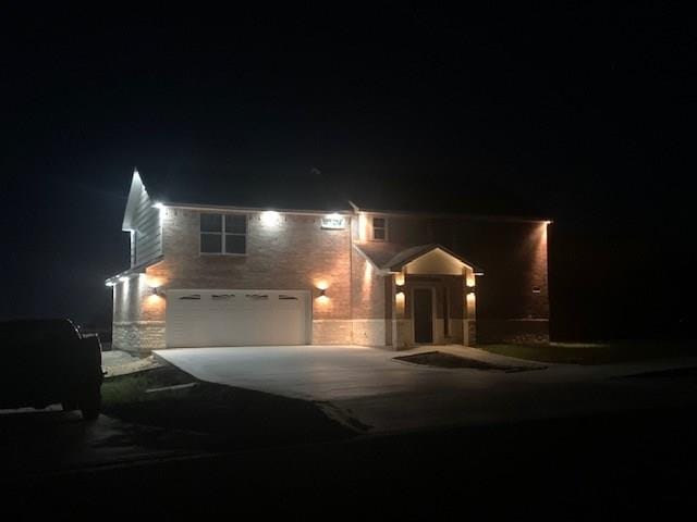 view of front of property featuring a garage