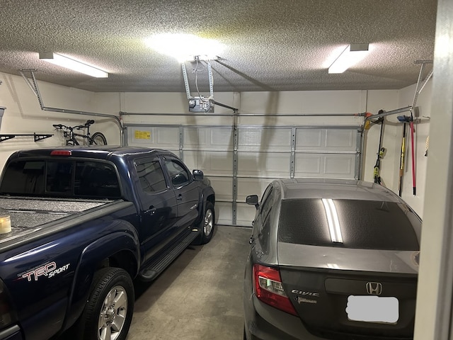 3570 Grandview Dr, San Angelo, TX 76904 - garage featuring a garage door opener