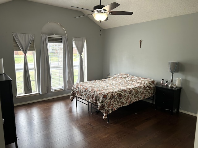 3570 Grandview Dr, San Angelo, TX 76904 - bedroom with vaulted ceiling, hardwood / wood-style floors, a textured ceiling, and a ceiling fan