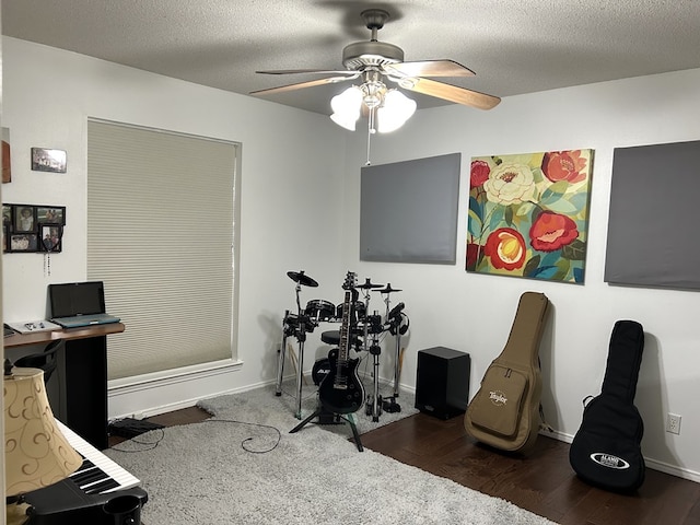 3570 Grandview Dr, San Angelo, TX 76904 - recreation room featuring a ceiling fan, wood finished floors, and a textured ceiling