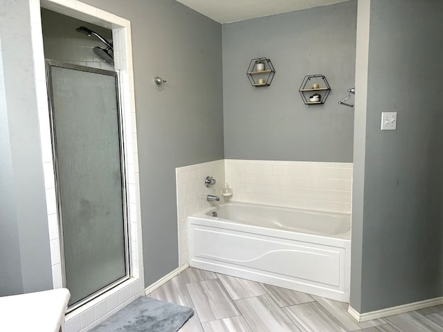 3570 Grandview Dr, San Angelo, TX 76904 - bathroom with a shower stall and a bath