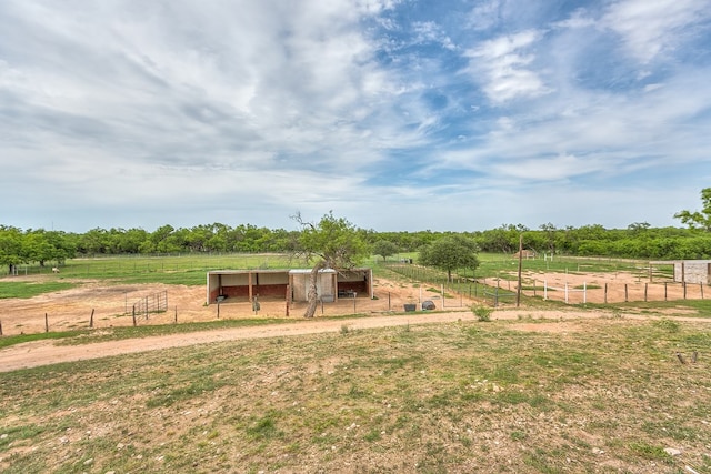 6290 Stokes Rd, San Angelo, TX 76904 - view of yard with a view of rural / pastoral area, an outdoor structure, and an exterior structure