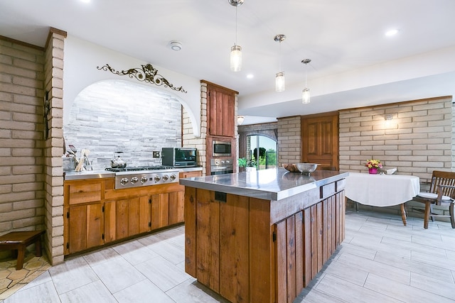 6290 Stokes Rd, San Angelo, TX 76904 - kitchen with appliances with stainless steel finishes, stainless steel countertops, brown cabinetry, decorative light fixtures, and recessed lighting