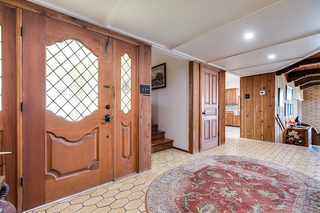 6290 Stokes Rd, San Angelo, TX 76904 - entrance foyer with wooden walls, stairs, and recessed lighting