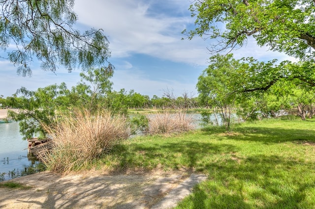 6290 Stokes Rd, San Angelo, TX 76904 - view of green lawn featuring a water view
