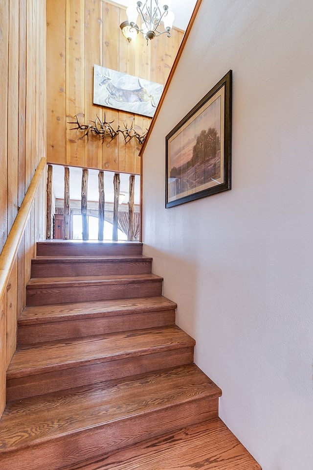 6290 Stokes Rd, San Angelo, TX 76904 - staircase with a chandelier
