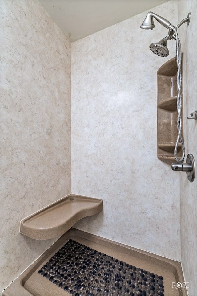 bathroom featuring walk in shower