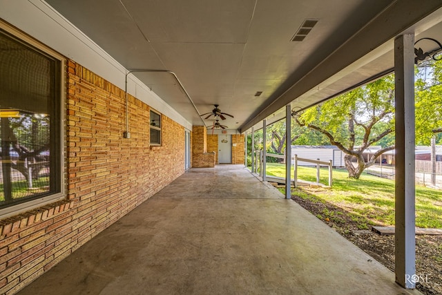 view of patio featuring ceiling fan