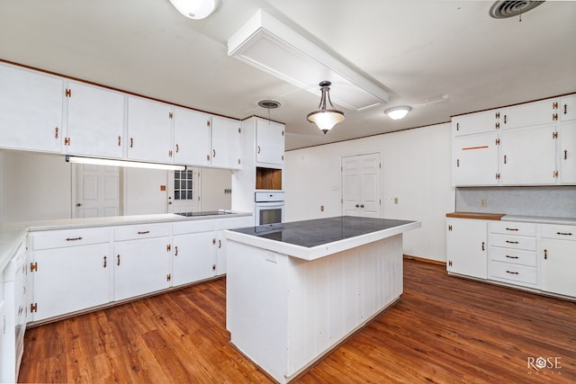 kitchen with white cabinets and a kitchen island