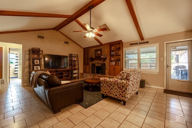 living room featuring ceiling fan, a stone fireplace, light tile patterned floors, and vaulted ceiling with beams