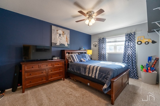 bedroom with light colored carpet and ceiling fan