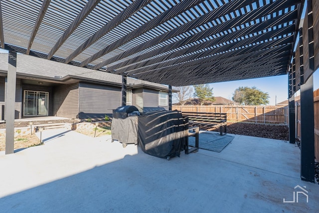 view of patio featuring a fenced backyard and a pergola