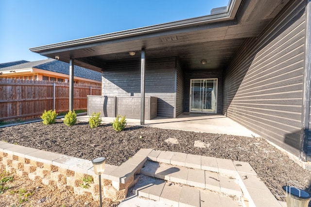 view of patio / terrace with fence