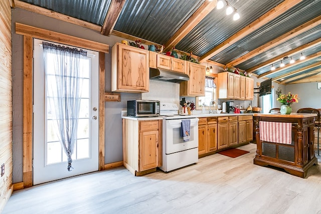 kitchen with white electric stove, plenty of natural light, light brown cabinetry, and light hardwood / wood-style flooring