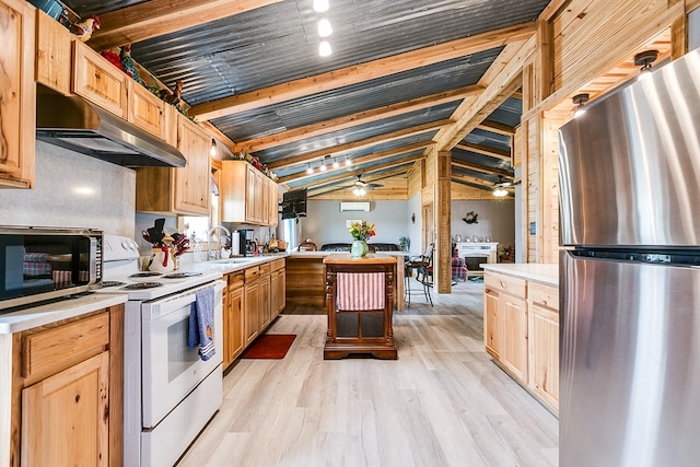 kitchen featuring appliances with stainless steel finishes, vaulted ceiling with beams, ceiling fan, light brown cabinets, and light hardwood / wood-style flooring