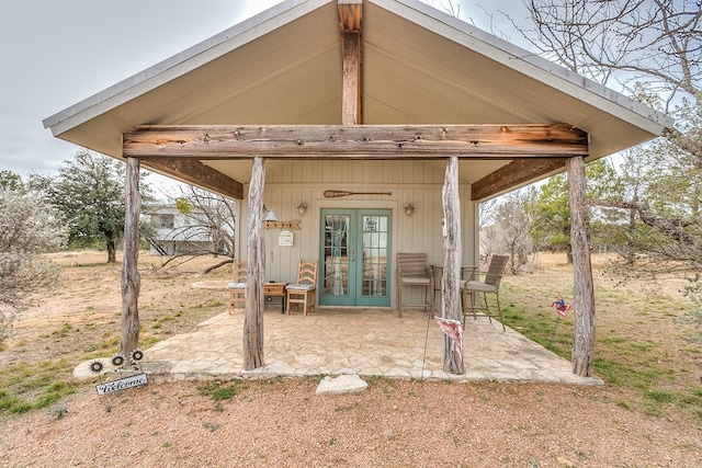 rear view of property with a patio and french doors