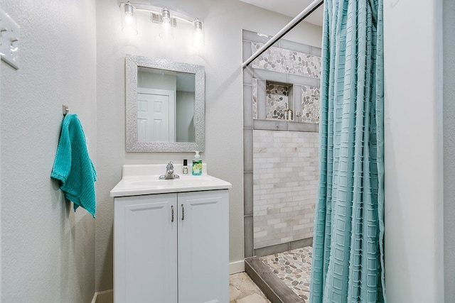 bathroom with vanity and a shower with curtain