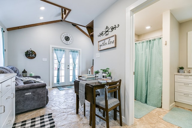 interior space with french doors and lofted ceiling