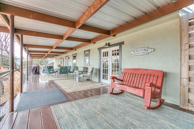 wooden terrace featuring french doors