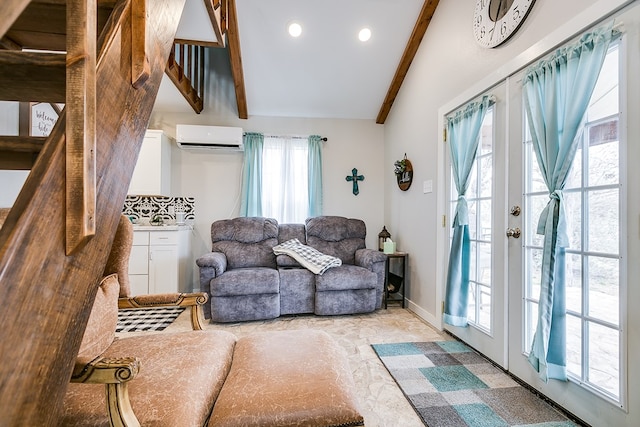 living room featuring lofted ceiling with beams, a wall mounted AC, and french doors