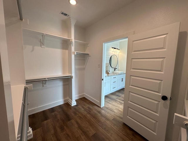 3611 Clearview Dr, San Angelo, TX 76904 - walk in closet featuring dark wood-style flooring