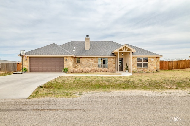 single story home featuring driveway, stone siding, fence, roof with shingles, and an attached garage