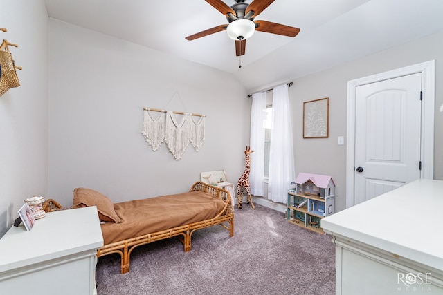 bedroom featuring carpet floors, lofted ceiling, and a ceiling fan