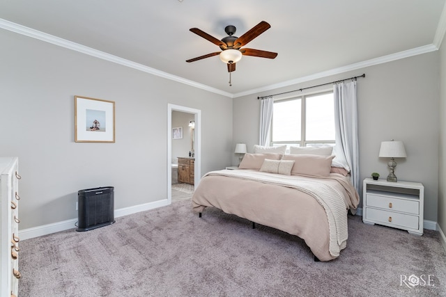 bedroom with crown molding, carpet flooring, and baseboards