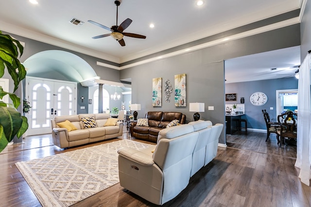 living room with ornamental molding, dark hardwood / wood-style floors, ceiling fan, and ornate columns