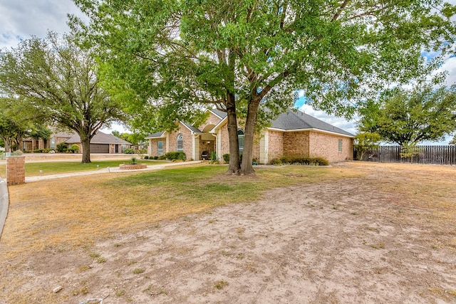 single story home with a front yard