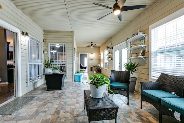 view of patio with an outdoor hangout area and ceiling fan