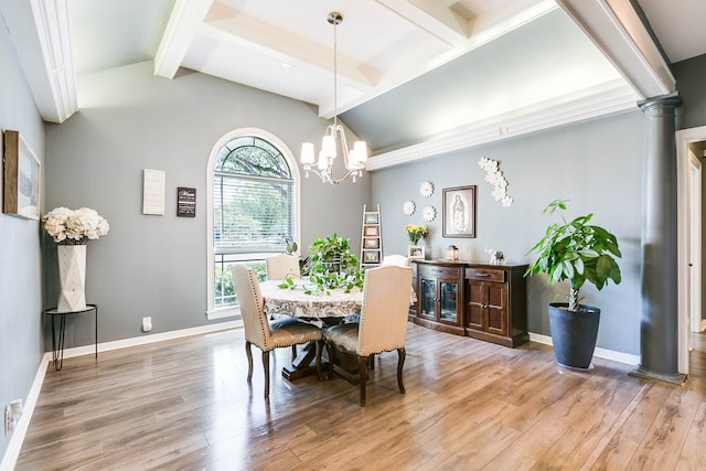 dining space with wood-type flooring, a chandelier, lofted ceiling with beams, and ornate columns