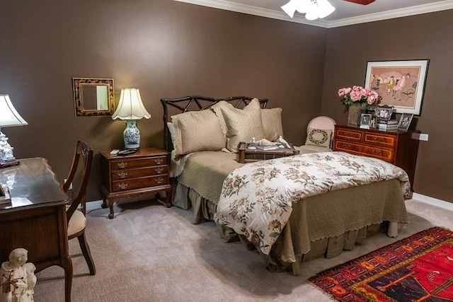 bedroom featuring crown molding, light colored carpet, and ceiling fan