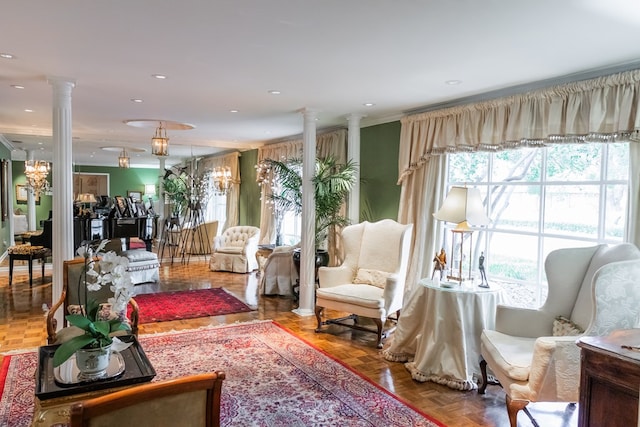 interior space featuring ornate columns, ornamental molding, and parquet floors