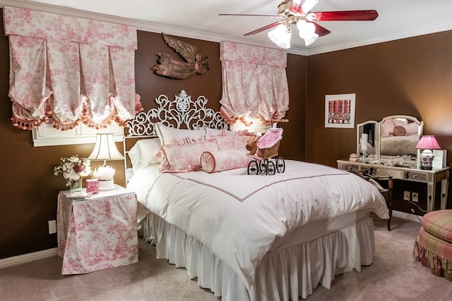 bedroom featuring ceiling fan, ornamental molding, and carpet flooring