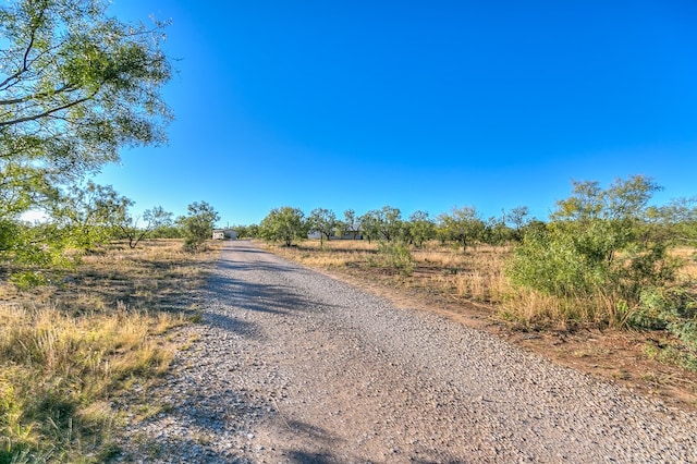 view of road featuring a rural view