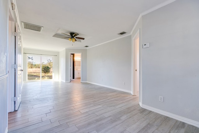 unfurnished room featuring ornamental molding, ceiling fan, and light wood-type flooring