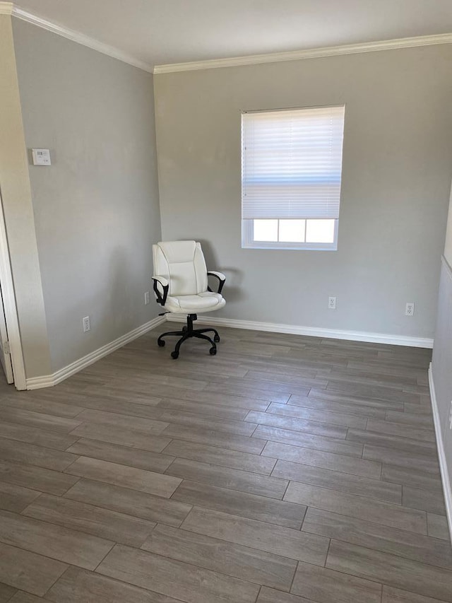 interior space with ornamental molding and dark hardwood / wood-style floors