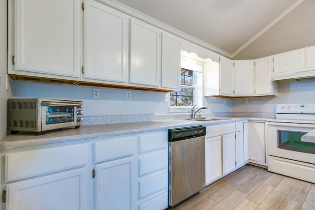 kitchen with vaulted ceiling, white electric range, dishwasher, sink, and white cabinets