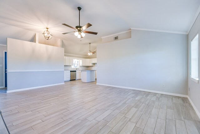 unfurnished living room with ornamental molding, lofted ceiling, and light hardwood / wood-style floors