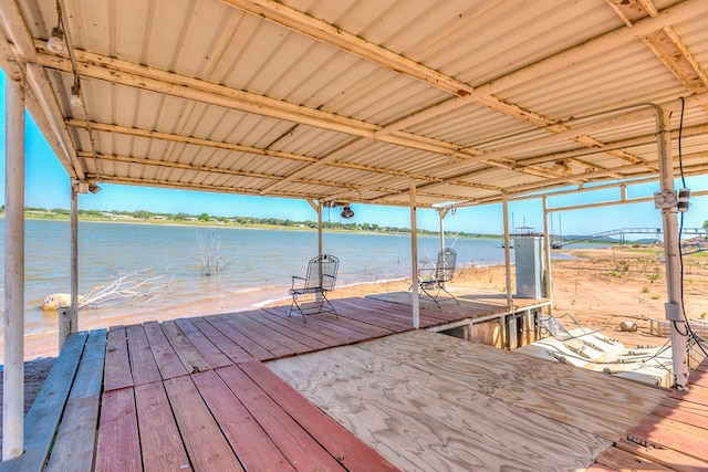 view of dock with a water view and boat lift