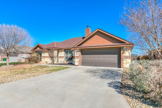 ranch-style house featuring a garage