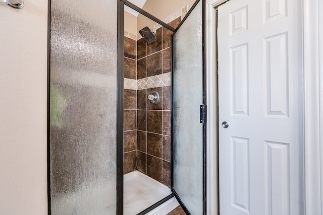 bathroom with an enclosed shower