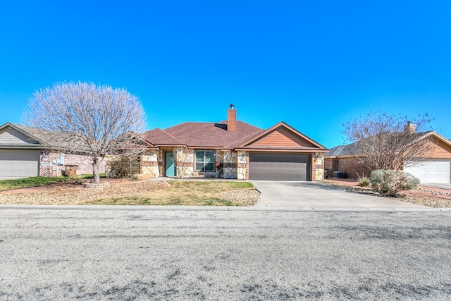 single story home featuring a garage