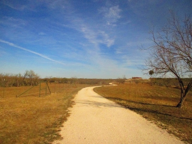 view of road featuring a rural view