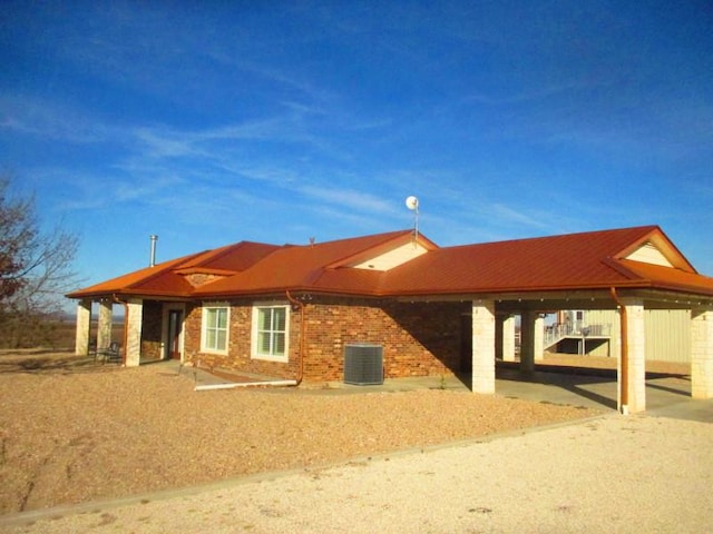 view of front of house featuring cooling unit