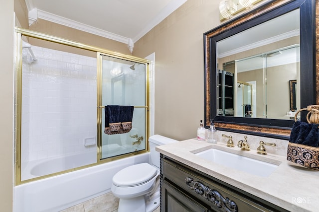 full bathroom featuring crown molding, vanity, shower / bath combination with glass door, and toilet