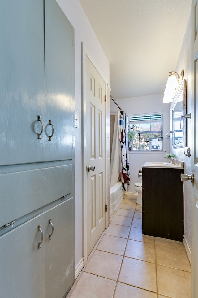 interior space featuring light tile patterned floors