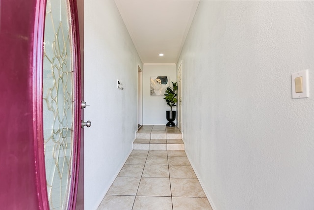 corridor featuring light tile patterned floors