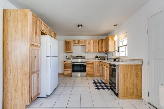 kitchen featuring appliances with stainless steel finishes, sink, hanging light fixtures, light tile patterned floors, and light brown cabinets